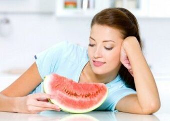 A girl goes on a watermelon diet to fight excess weight. 